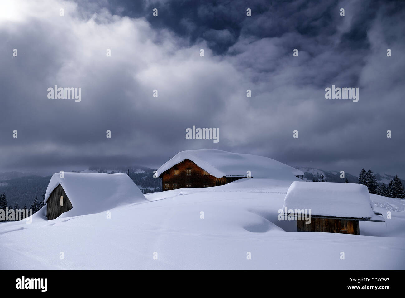 Alpine huts covered with lots of snow, Balderschwang, Allgäu, Bavaria, Germany Stock Photo
