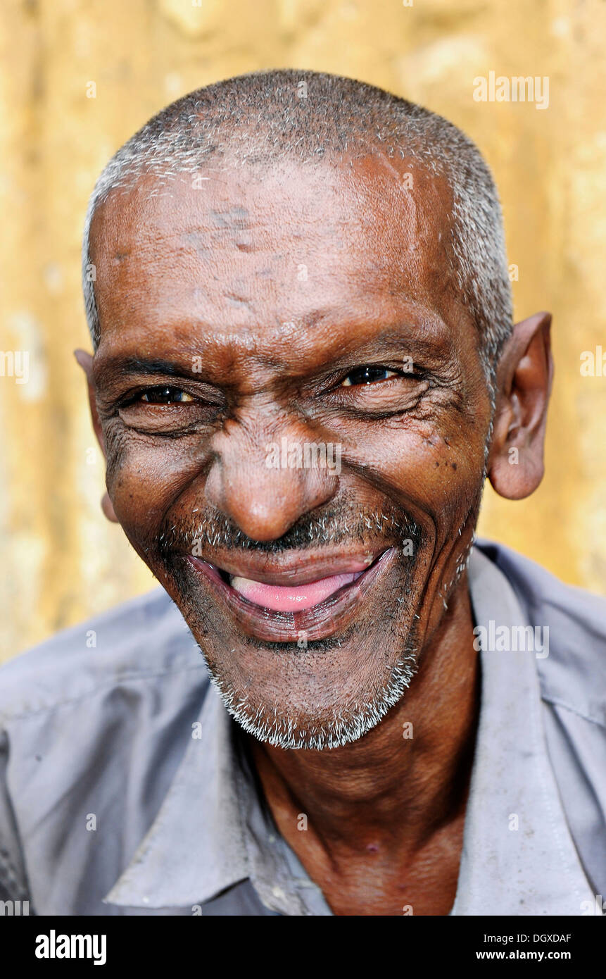 Portrait of a laughing elderly man, probably of Indian origin, in Yangon, Myanmar, Burma, Southeast Asia, Asia Stock Photo