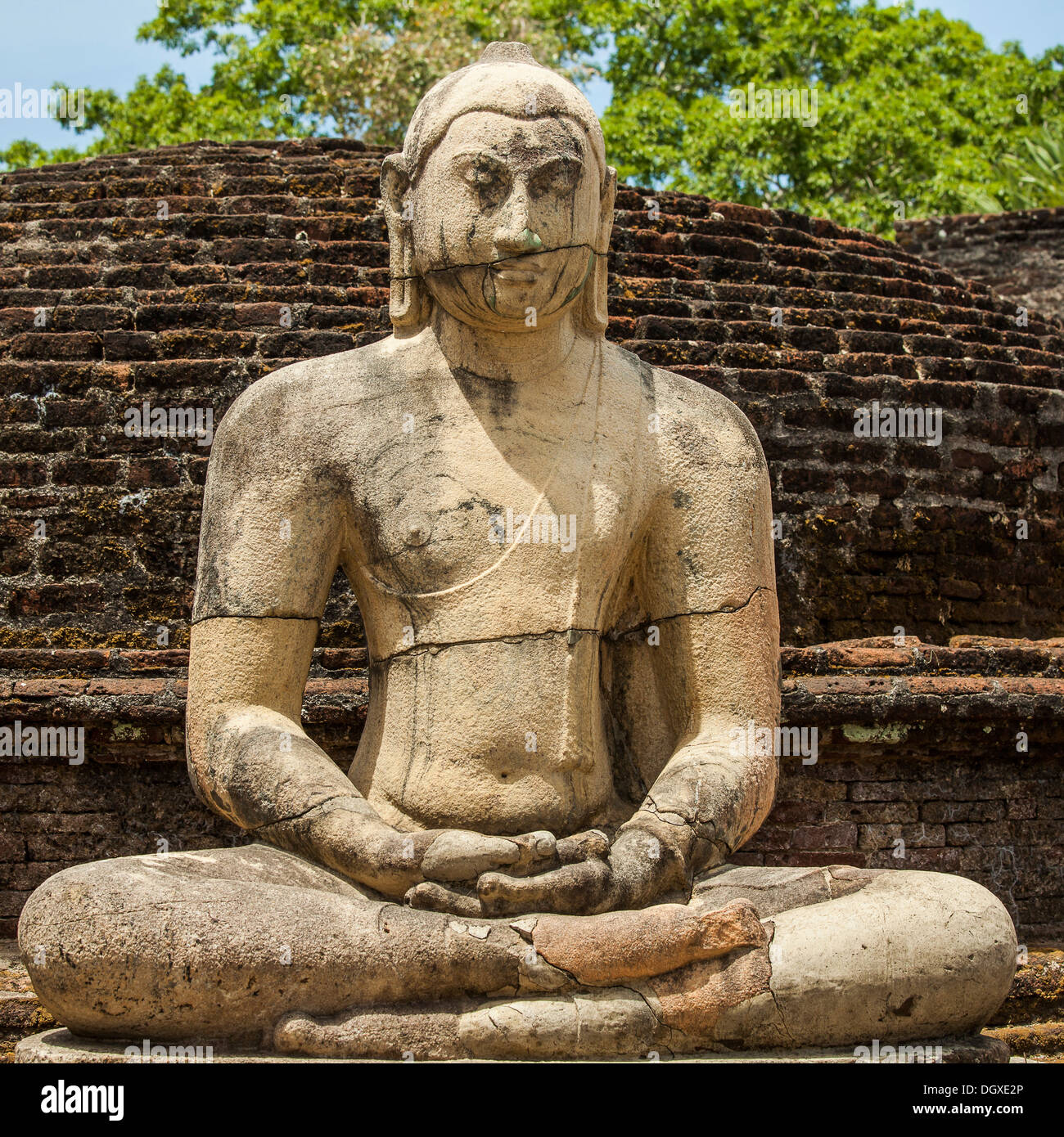 Ancient Buddha statue in meditation Stock Photo