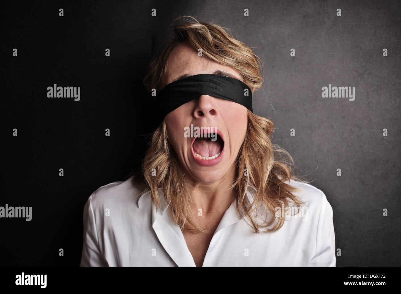 Blindfolded person hi-res stock photography and images - Alamy