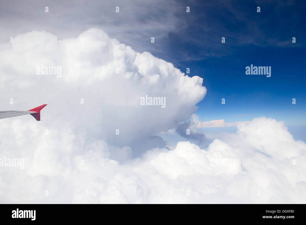 Airplane in sky with white clouds vector hi-res stock photography and ...