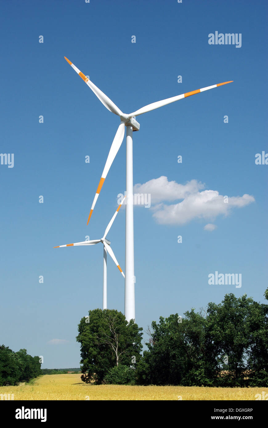 wind turbine on blue sky background Stock Photo - Alamy