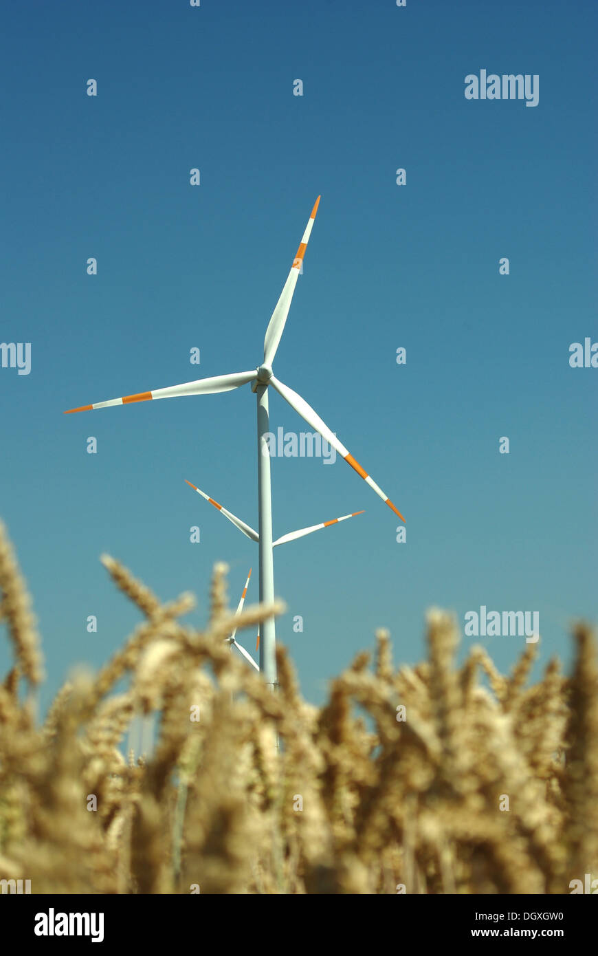 wind turbine on blue sky background Stock Photo - Alamy