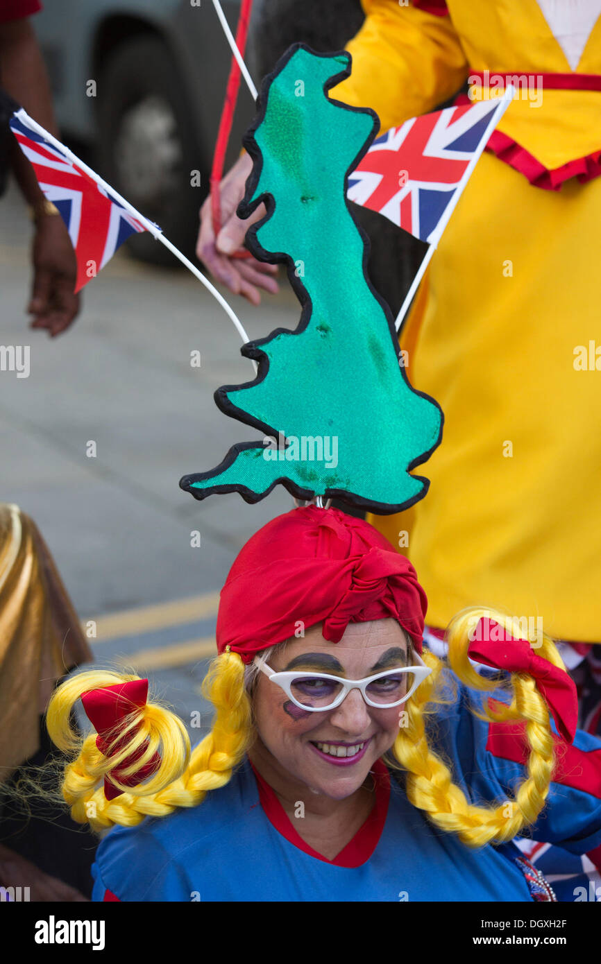 London, UK. 27 Oct, 2013. Hackney Empire and St Joseph’s Hospice joined forces to create a 1km run that invited people to dress in their most fabulous dame costumes or as their favourite pantomime characters. It was set up to help Hackney Empire raise funds to keep the arts accessible for all ages and enable St Joseph’s Hospice to provide the best care for people of East London with terminal illness. Cast from the forthcoming Puss in Boots at the Hackney Empire took part. Photo: Nick Savage/Alamy Live News Stock Photo