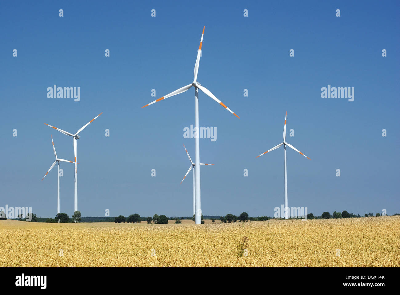 wind turbine on blue sky background Stock Photo - Alamy