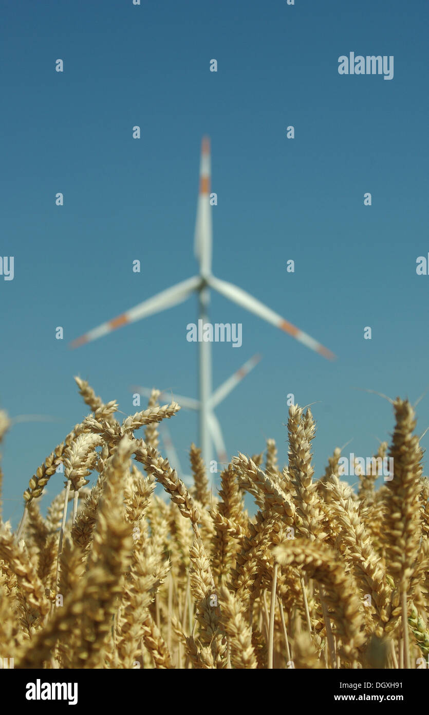 wind turbine on blue sky background Stock Photo - Alamy