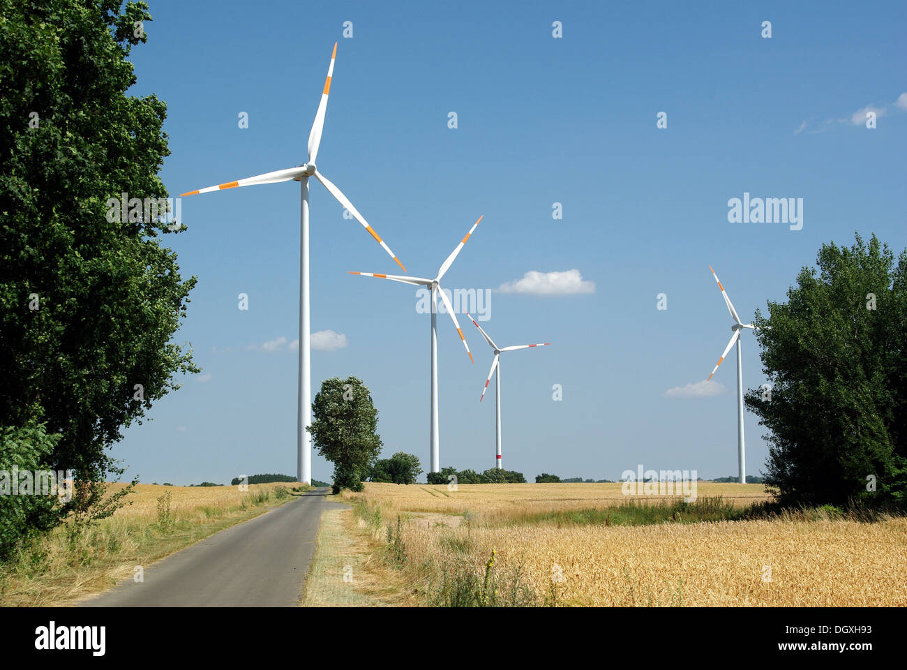 wind turbine on blue sky background Stock Photo - Alamy