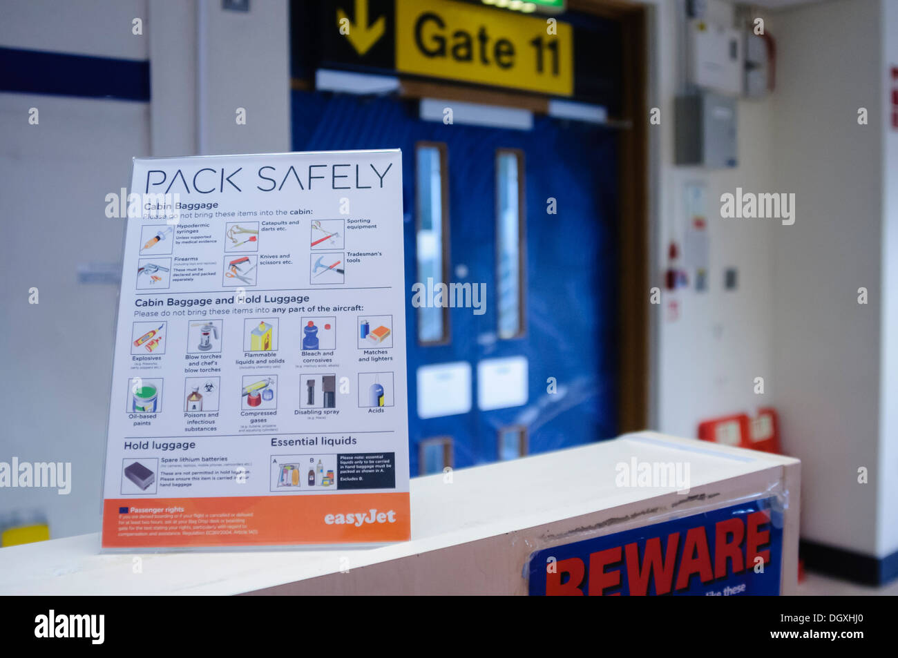 Sign at an Easyjet departure gate describing prohibited items Stock Photo