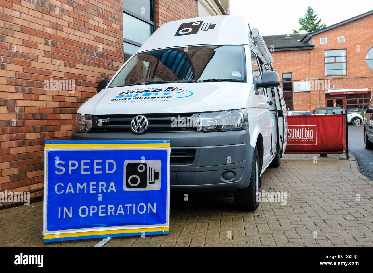 Speed camera van with a sign saying 'Speed Camera in Operation' Stock Photo