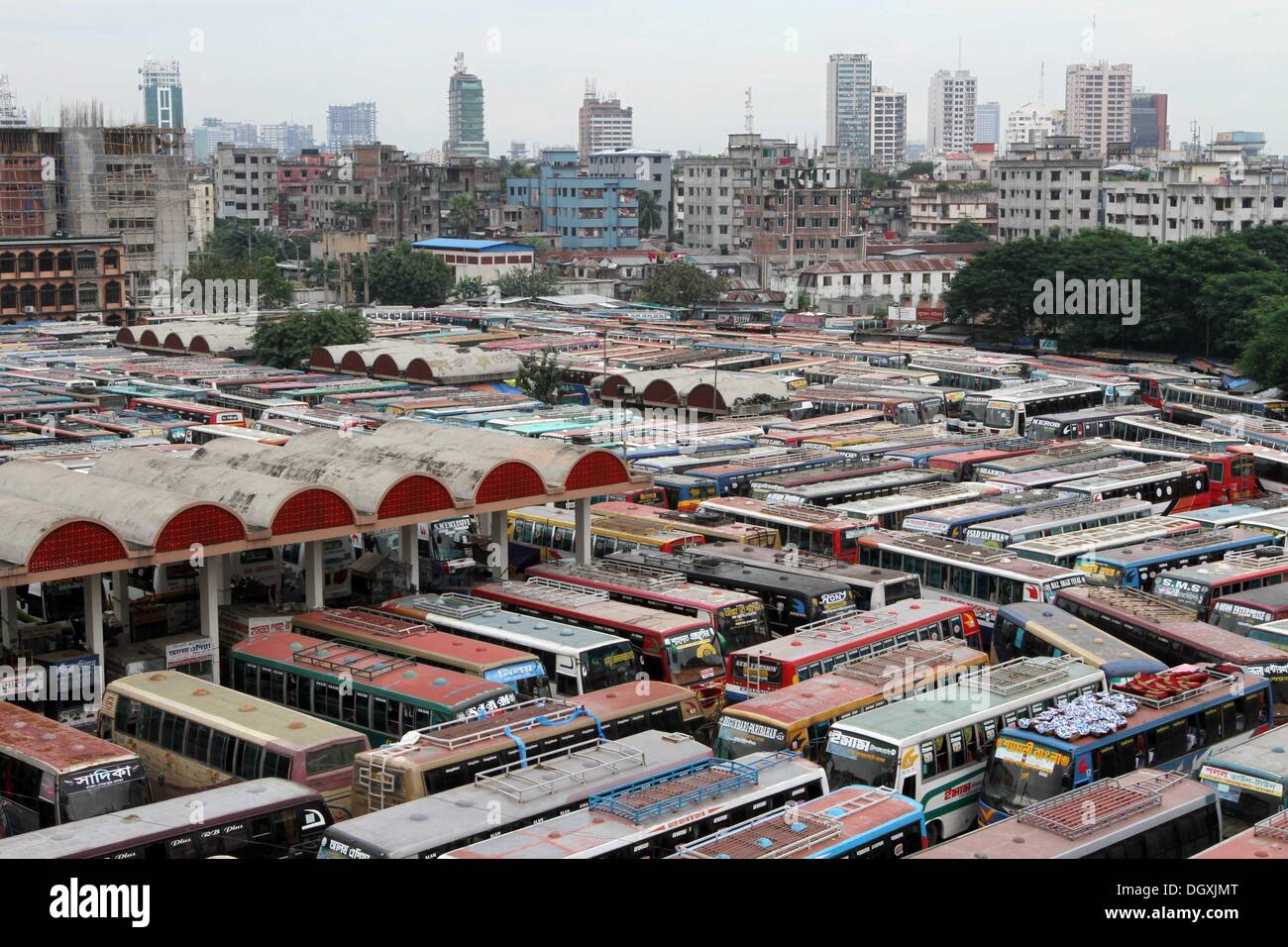 Dhaka, Bangladesh. 27th Oct, 2013. Buses are parked at an inter-district bus during a nationwide strike called by the opposition Bangladesh Nationalist Party (BNP) in Dhaka on October 27, 2013. Three people were killed in nationwide clashes as Bangladesh's opposition began a strike to demand the prime minister quit and make way for polls under a caretaker government. Stock Photo