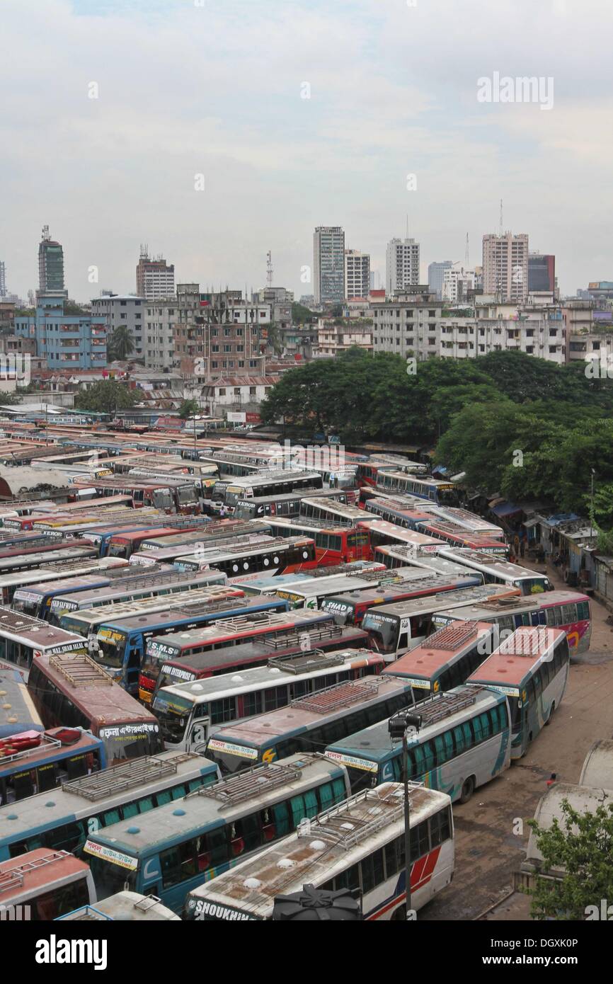 Dhaka, Bangladesh. 27th Oct, 2013. Buses are parked at an inter-district bus during a nationwide strike called by the opposition Bangladesh Nationalist Party (BNP) in Dhaka on October 27, 2013. Three people were killed in nationwide clashes as Bangladesh's opposition began a strike to demand the prime minister quit and make way for polls under a caretaker government. Stock Photo