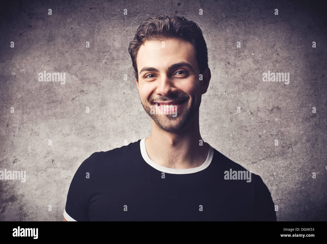 Portrait of a smiling boy in black t-shirt Stock Photo