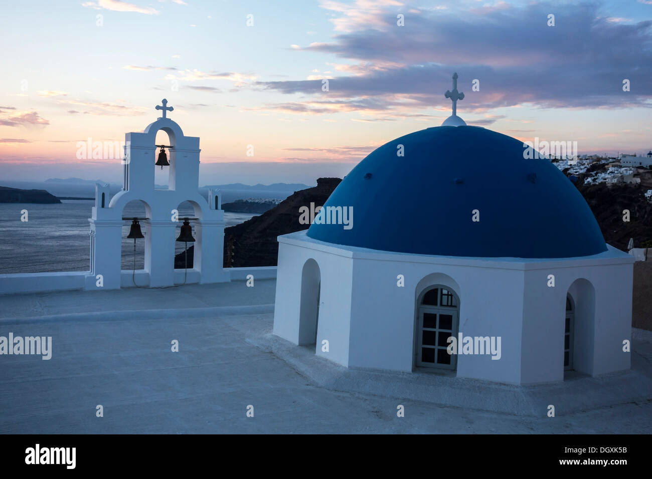 Sunset in Santorini church (Firostefani), Greece Stock Photo