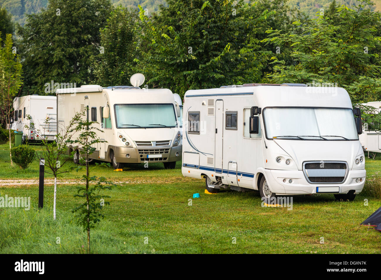 Mobile Home; Camping; Vehicle Trailer; Car; Tent; Summer; Holiday; Vacations; Park; Travel Destinations; Field; Travel; Grass; Stock Photo