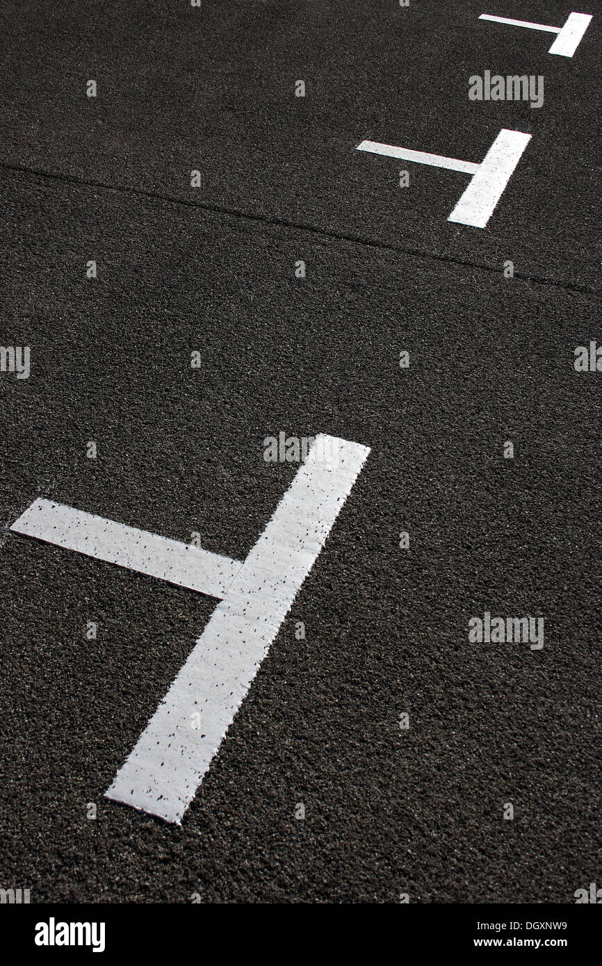 Road markings for parking spaces Stock Photo