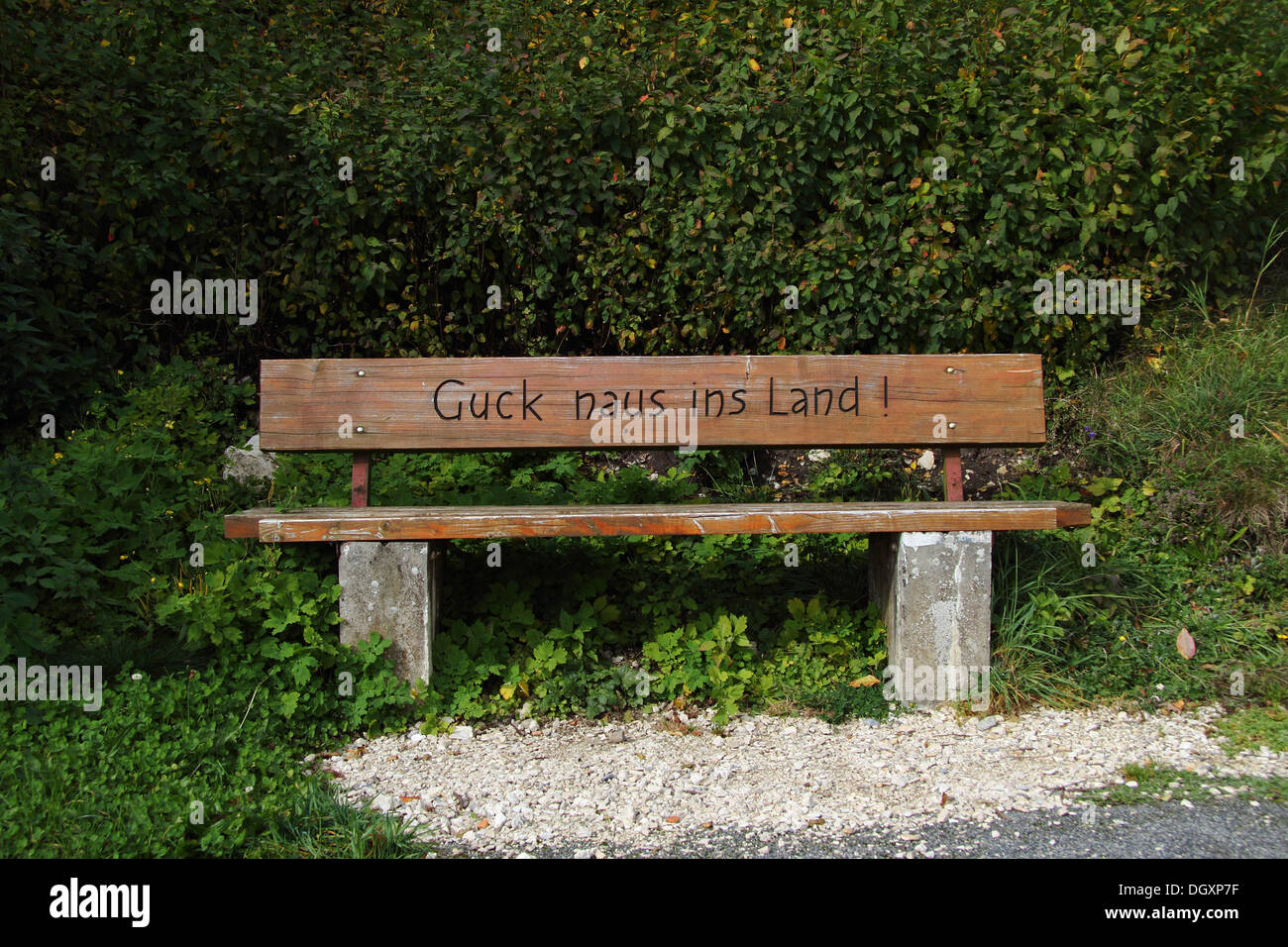 Swabian saying, Guck naus ins Land!, Swabian for Look into the country, on a bench near Offingen, Upper Swabia Stock Photo