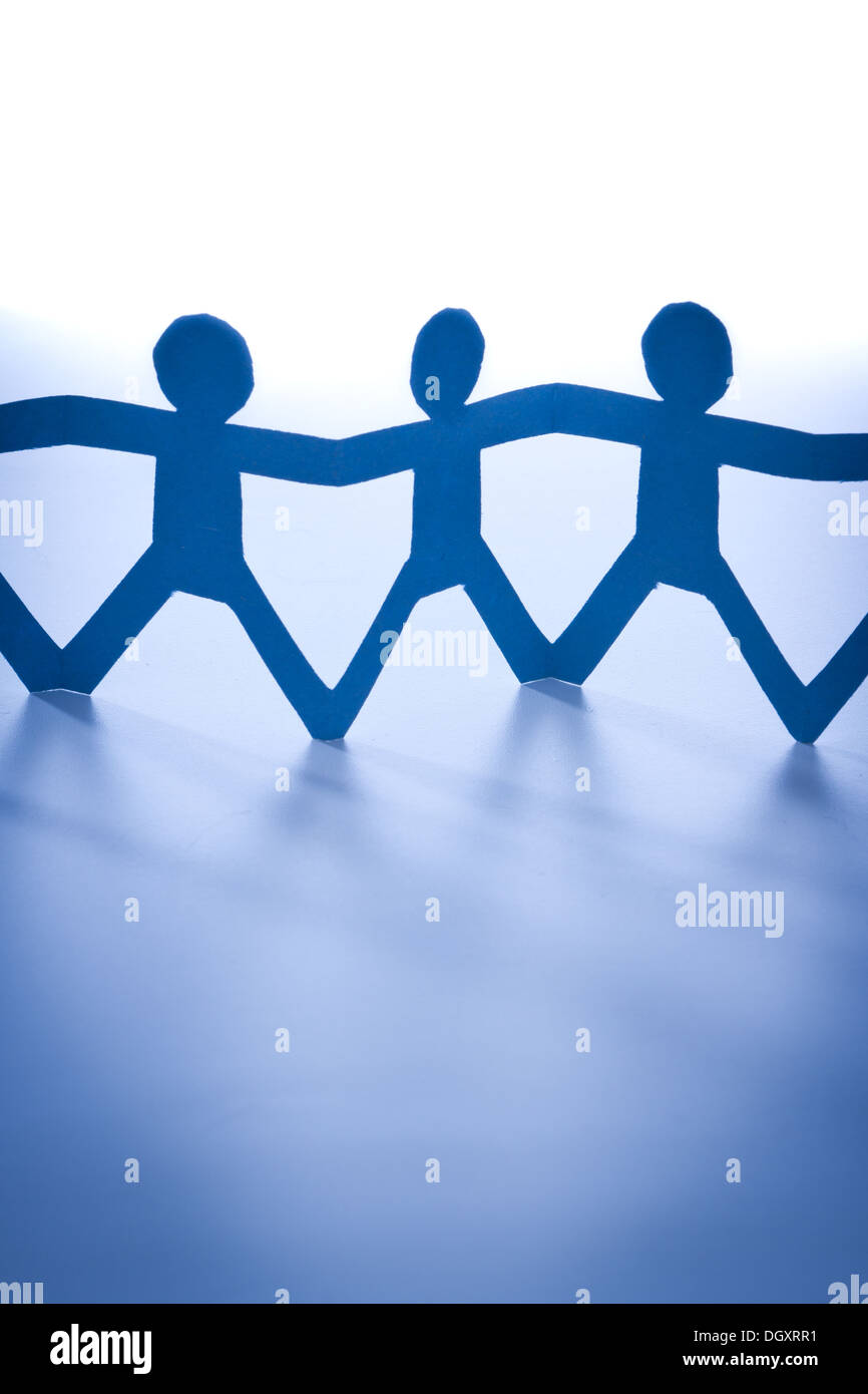 Paper Cutout Of People Concept Of People Coming Together And Working