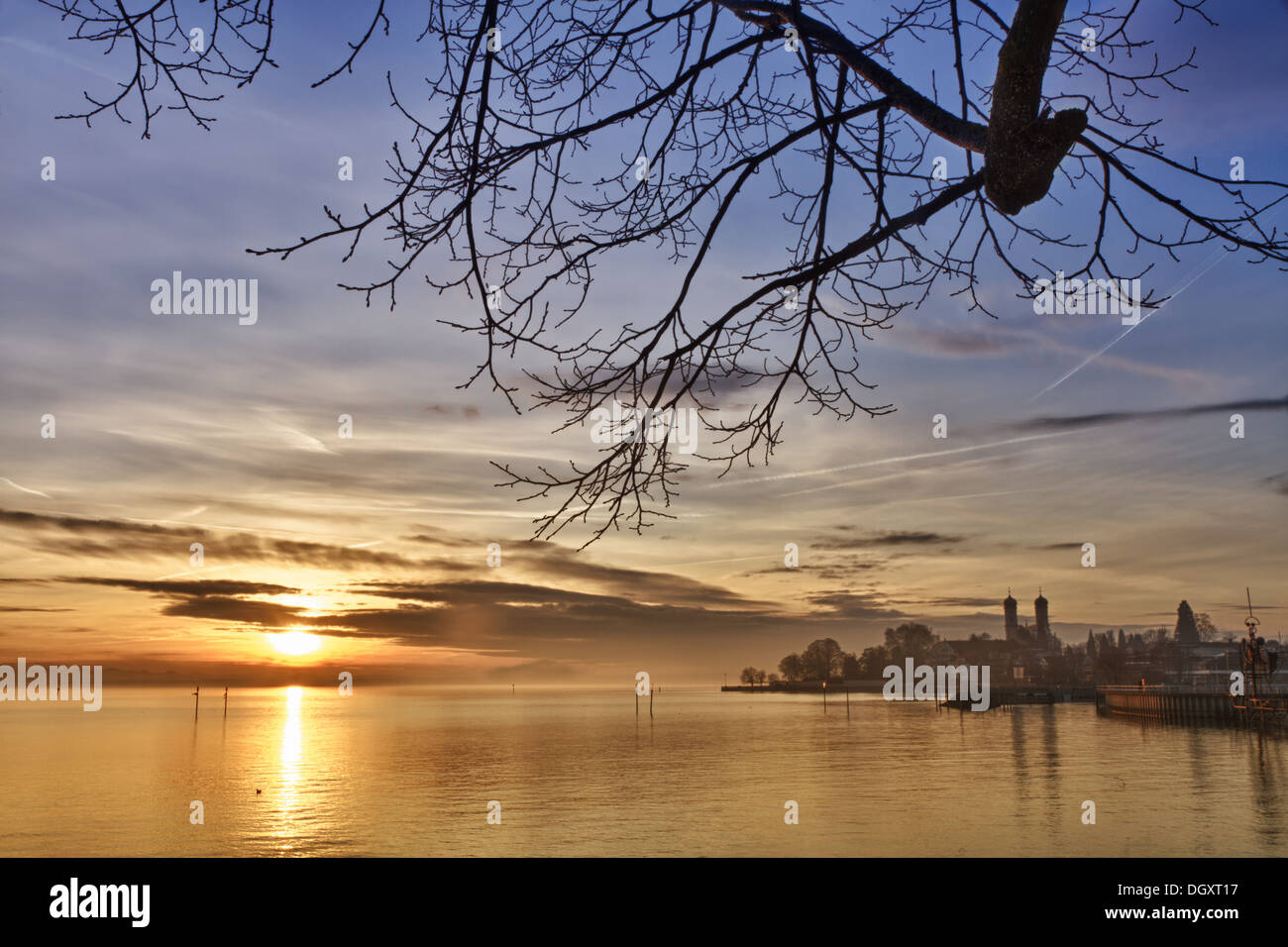 Bodensee (Lake Constance) with Schlosskirche (church) of Friedrichshafen at sunset, Germany Stock Photo