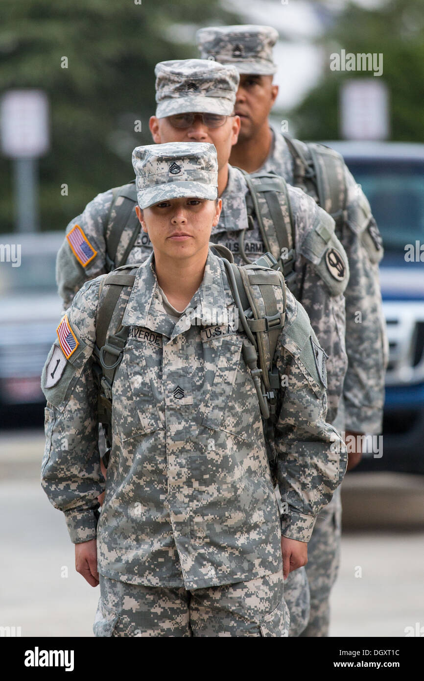 Male and female Drill Sergeant candidates at the US Army Drill Instructors School Fort Jackson during formation September 26, 2013 in Columbia, SC. While 14 percent of the Army is women soldiers there is a shortage of female Drill Sergeants. Stock Photo