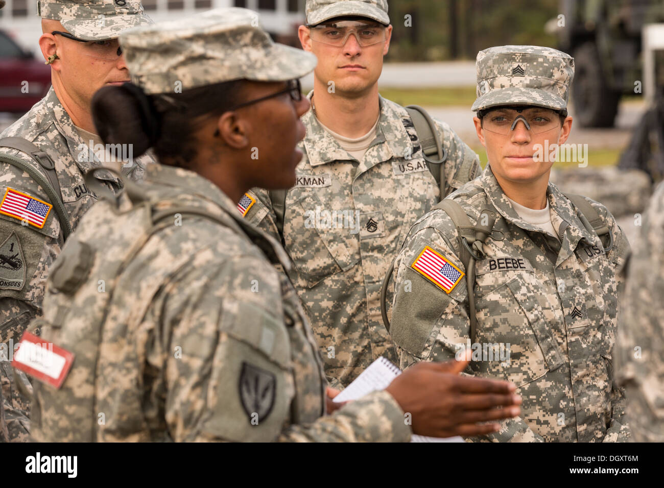 Male and female Drill Sergeant candidates at the US Army Drill Instructors School Fort Jackson during formation September 26, 2013 in Columbia, SC. While 14 percent of the Army is women soldiers there is a shortage of female Drill Sergeants. Stock Photo