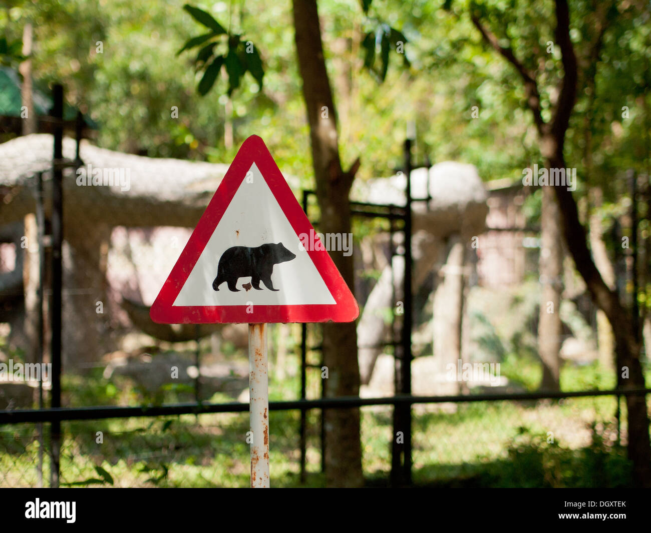 Caution: bears! :O A bear warning sign on the grounds of the Phnom Tamao Wildlife Rescue Center in Phnom Tamao, Cambodia. Stock Photo