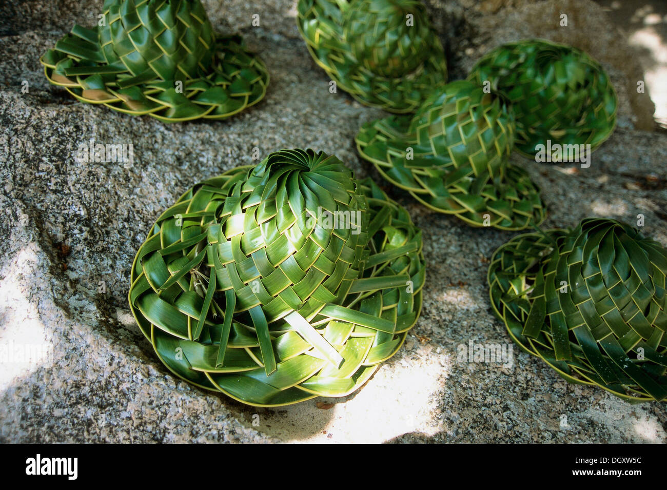 Handmade hats made from palm leaves, Anse Source dÀrgent, La Digue, Seychelles Stock Photo