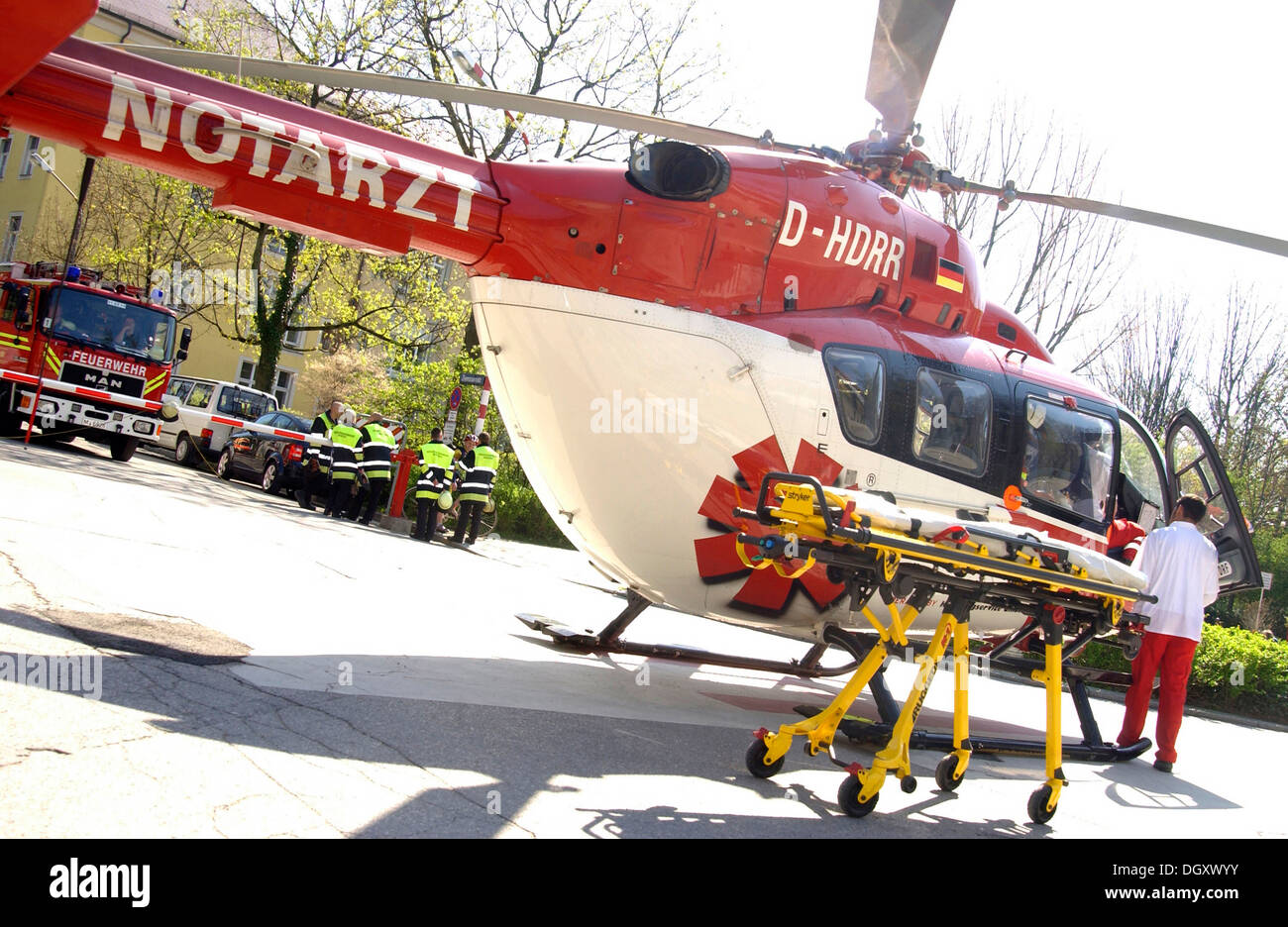 Helicopter in operation with emergency medical and fire services in the city, Munich, Upper Bavaria, Bavaria, Germany Stock Photo