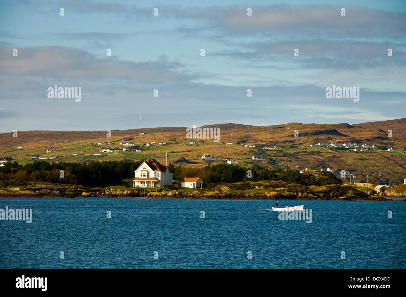 Island homes and property a house on Gola Island with Arranmore behind in County Donegal Ireland