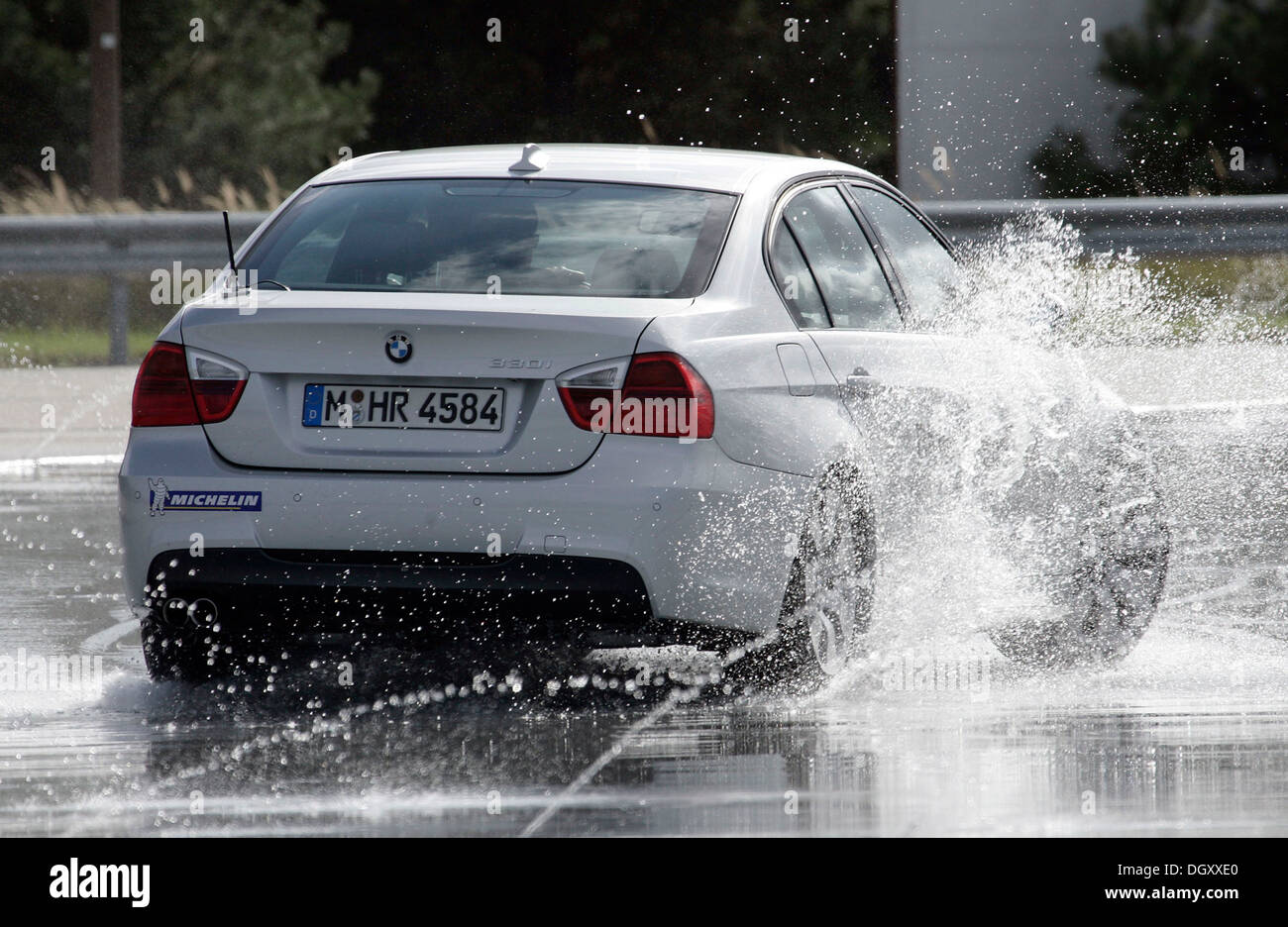 BMW driver safety training on wet asphalt in a BMW 3, Templin, Brandenburg Stock Photo