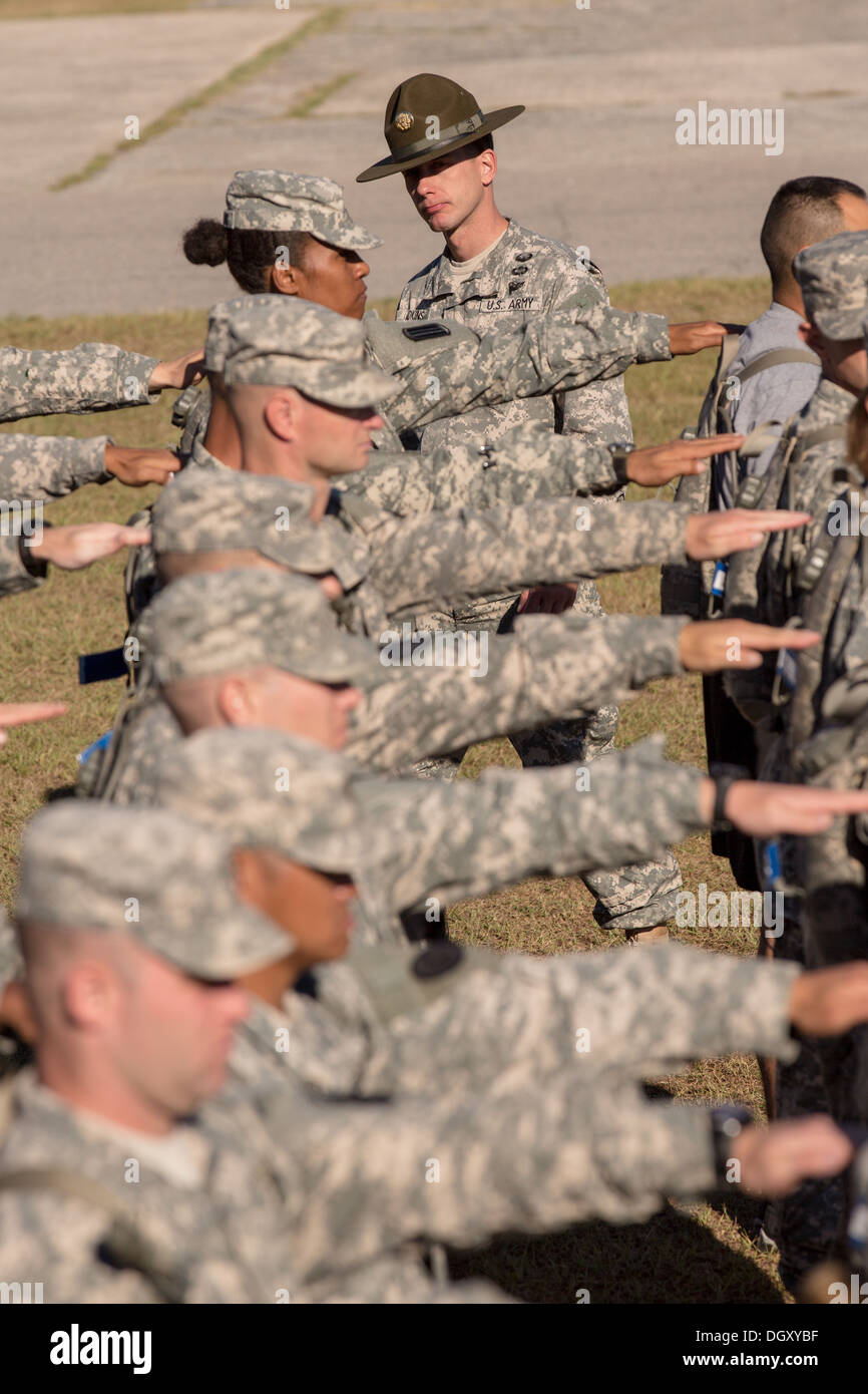 Male and female Drill Sergeant candidates at the US Army Drill Instructors School Fort Jackson during close order drill exercises September 27, 2013 in Columbia, SC. While 14 percent of the Army is women soldiers there is a shortage of female Drill Sergeants. Stock Photo