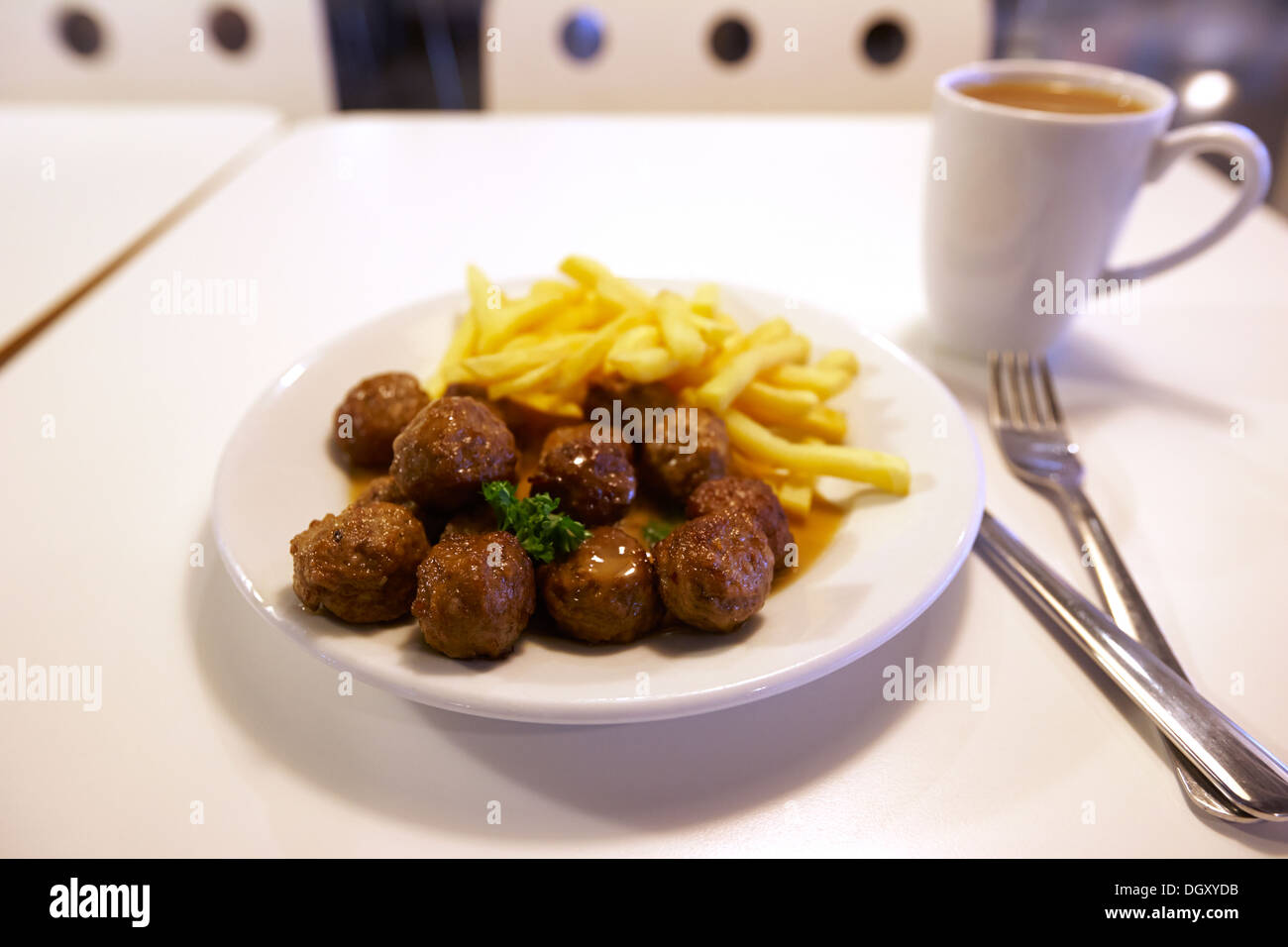 swedish meatballs gravy and fries in the ikea restaurant Stock Photo