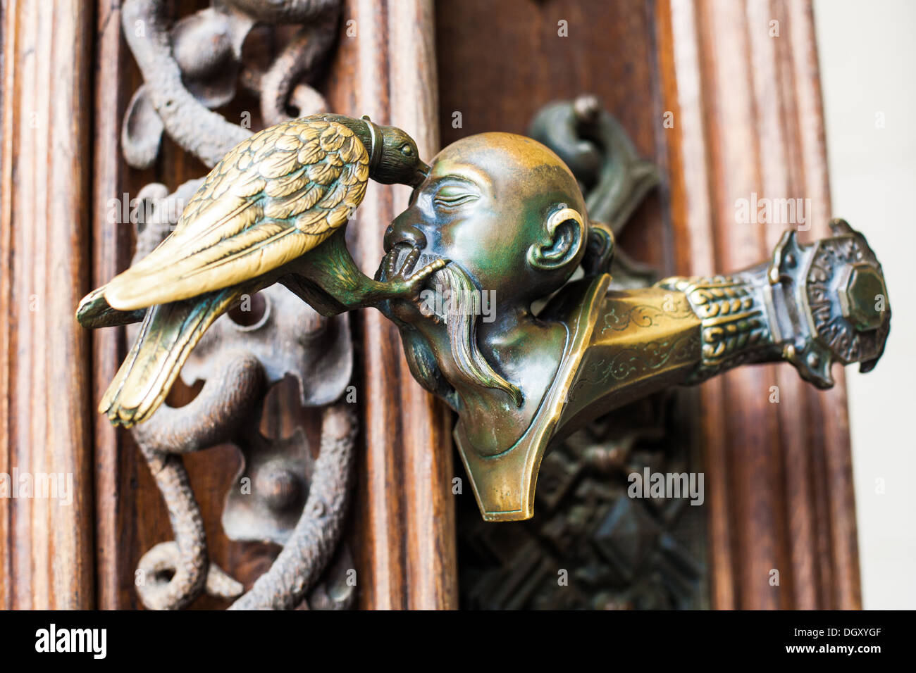 Decorative antique, metal door handles with bird pattern Stock Photo
