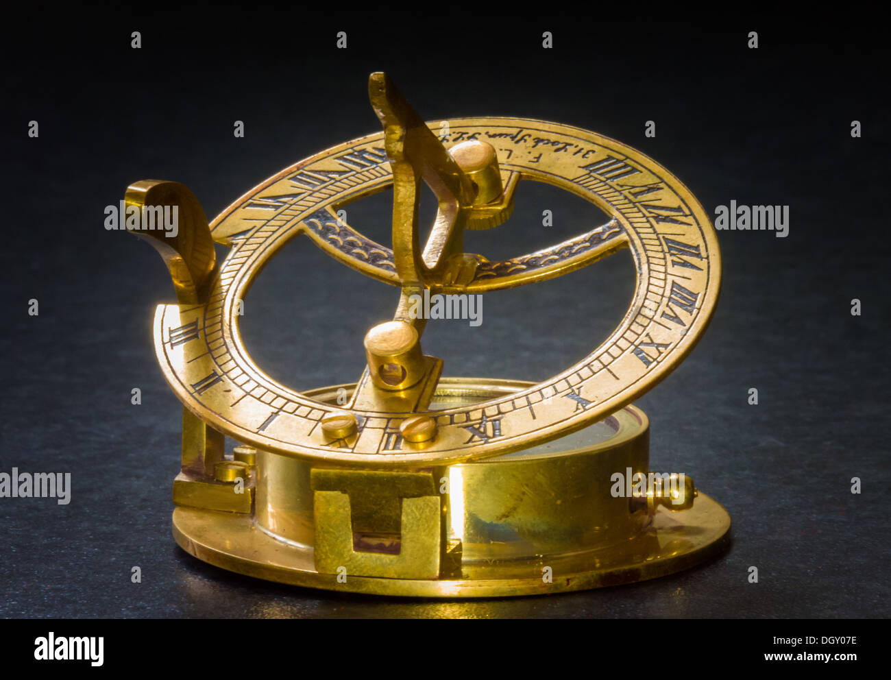 Old copper sextant and compass Stock Photo