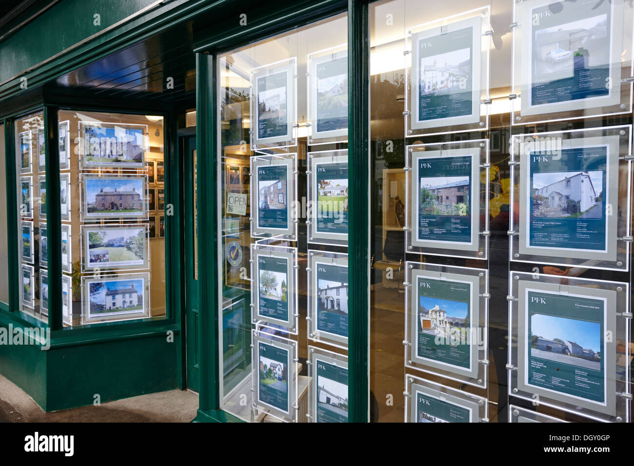 lake district properties for sale in an estate agency window