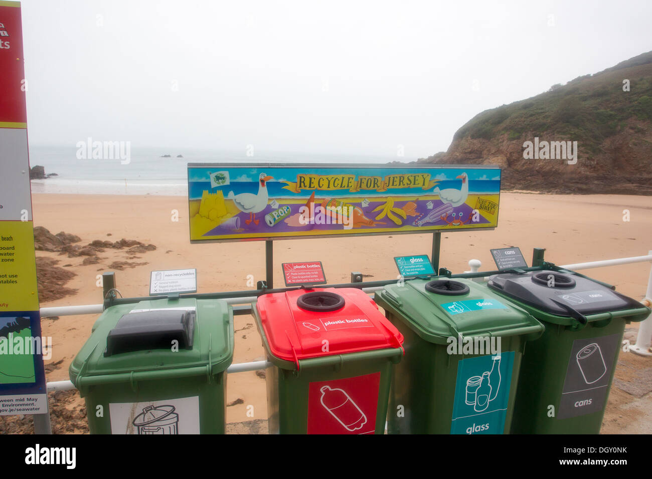 Recycle for Jersey green wheelie bins at Grève de Lecq Stock Photo Alamy