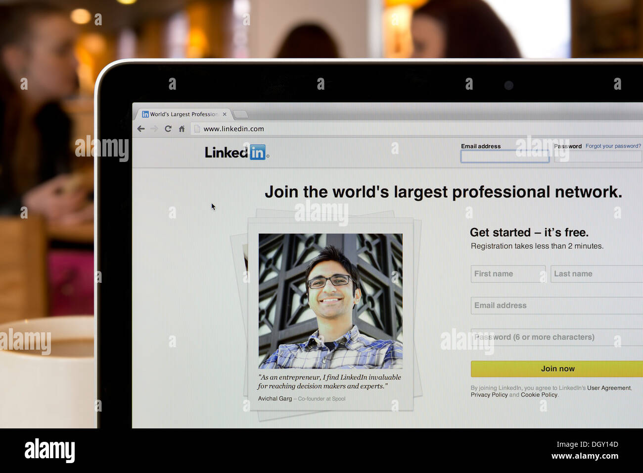 The LinkedIn website shot in a coffee shop environment (Editorial use only: print, TV, e-book and editorial website). Stock Photo