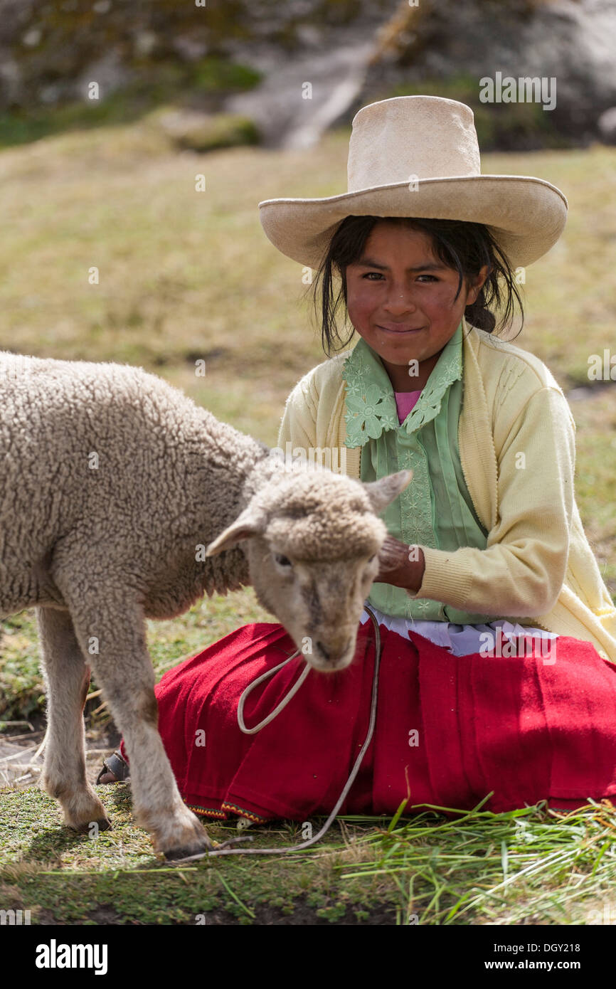 Peruvian shepherd girl with a straw hat, Cumbemajo, Peru, South America Stock Photo