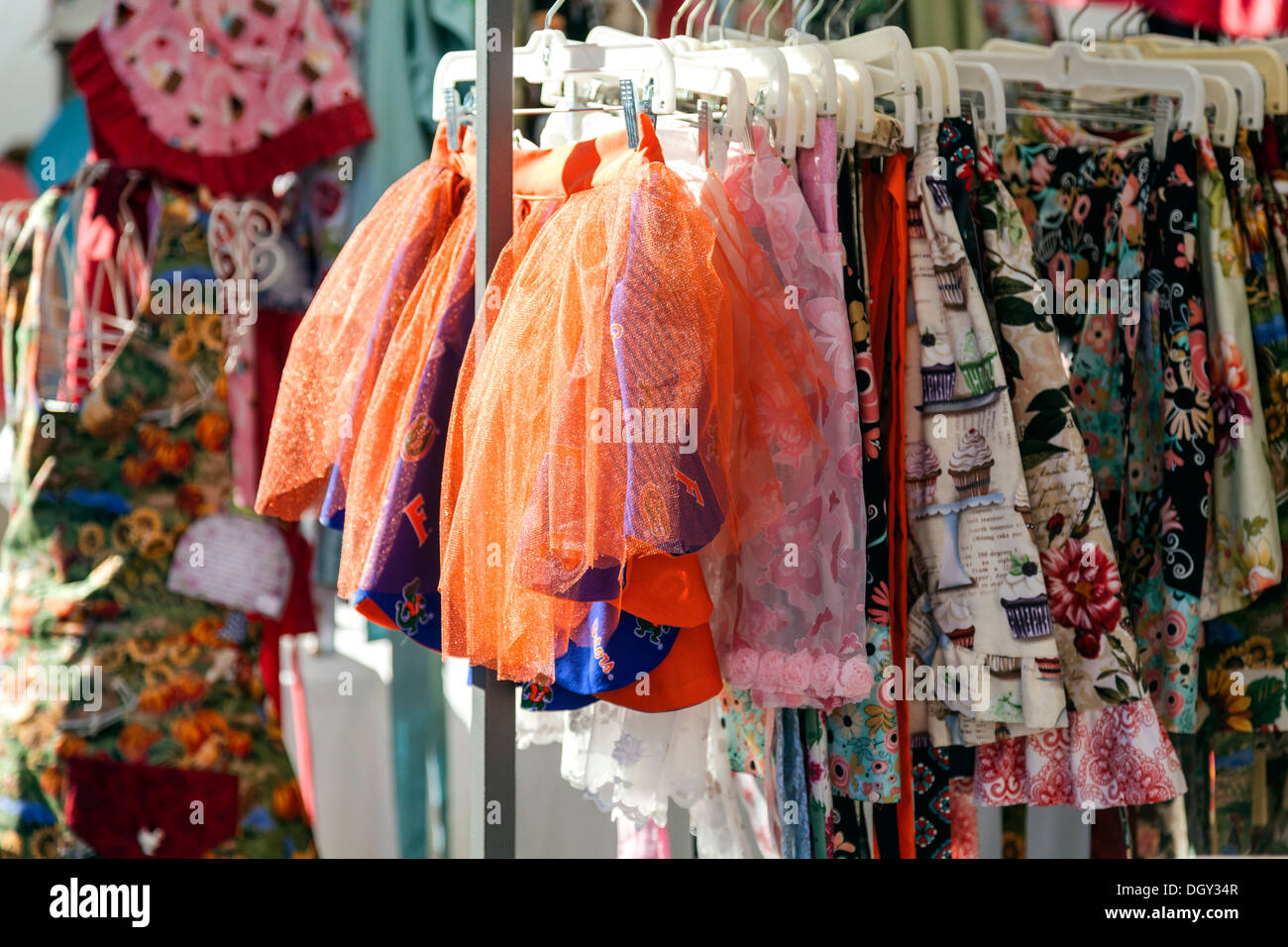 Colorful children's skirts, tutus and clothes for sale at the Mount Dora Crafts Fair Festival. Stock Photo