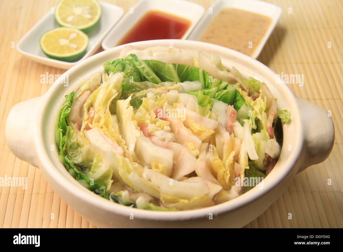 Pot of Chinese cabbage and pork belly Stock Photo
