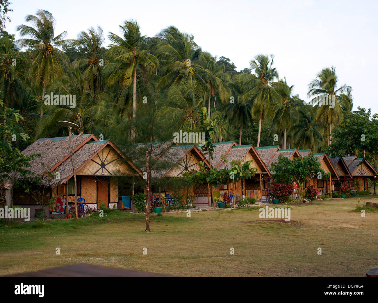 Resort with typical wooden cottages and thatched roofs on Ko Hai island, Ko Ngai, Andaman Sea, Satun Province, southern Thailand Stock Photo