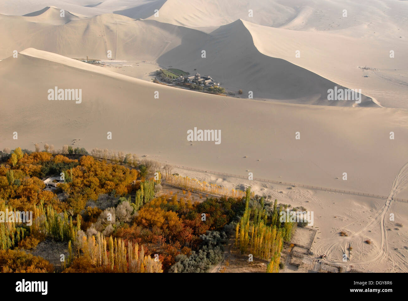 Aerial view of Crescent Lake and the giant sand dunes in the Gobi Desert, Silk Road, Dunhuang, in Gansu, China, Asia Stock Photo