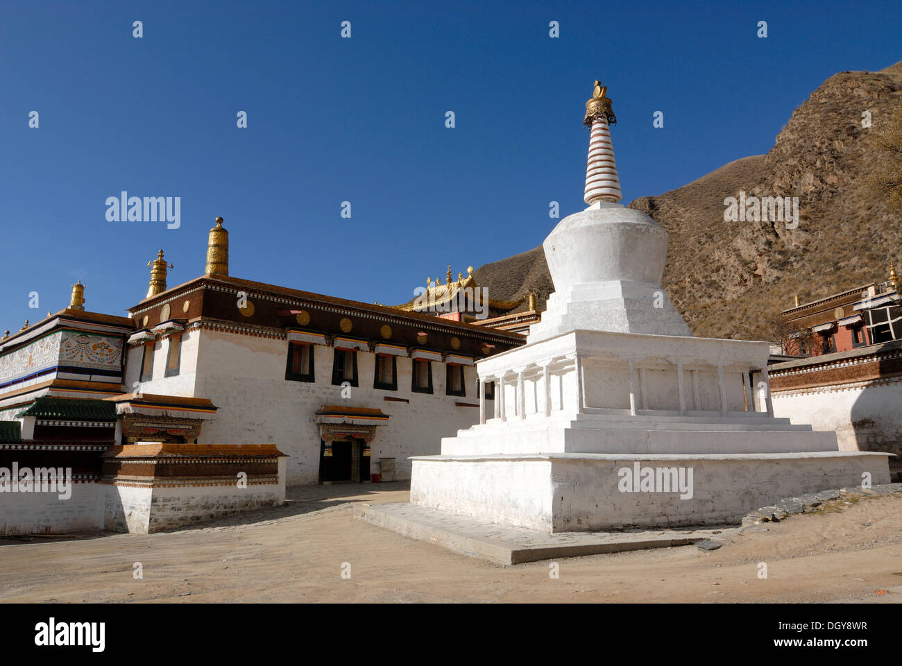 Large white stupa and monastery building of Labrang Monastery, Xiahe, Gansu, China, Asia Stock Photo