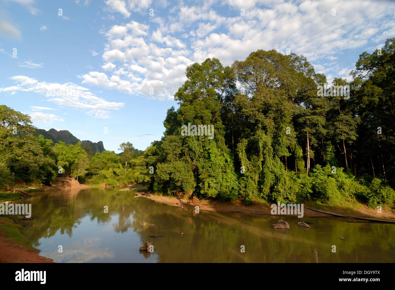 Subtropical river landscape near of the 7.5 km long cave of Tham Kong Lor, amidst the dense subtropical rainforest, Khammouane Stock Photo