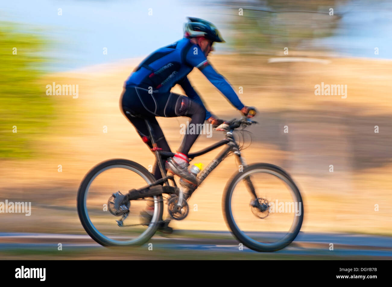 Mountain bike, Rider in blurred motion Stock Photo - Alamy