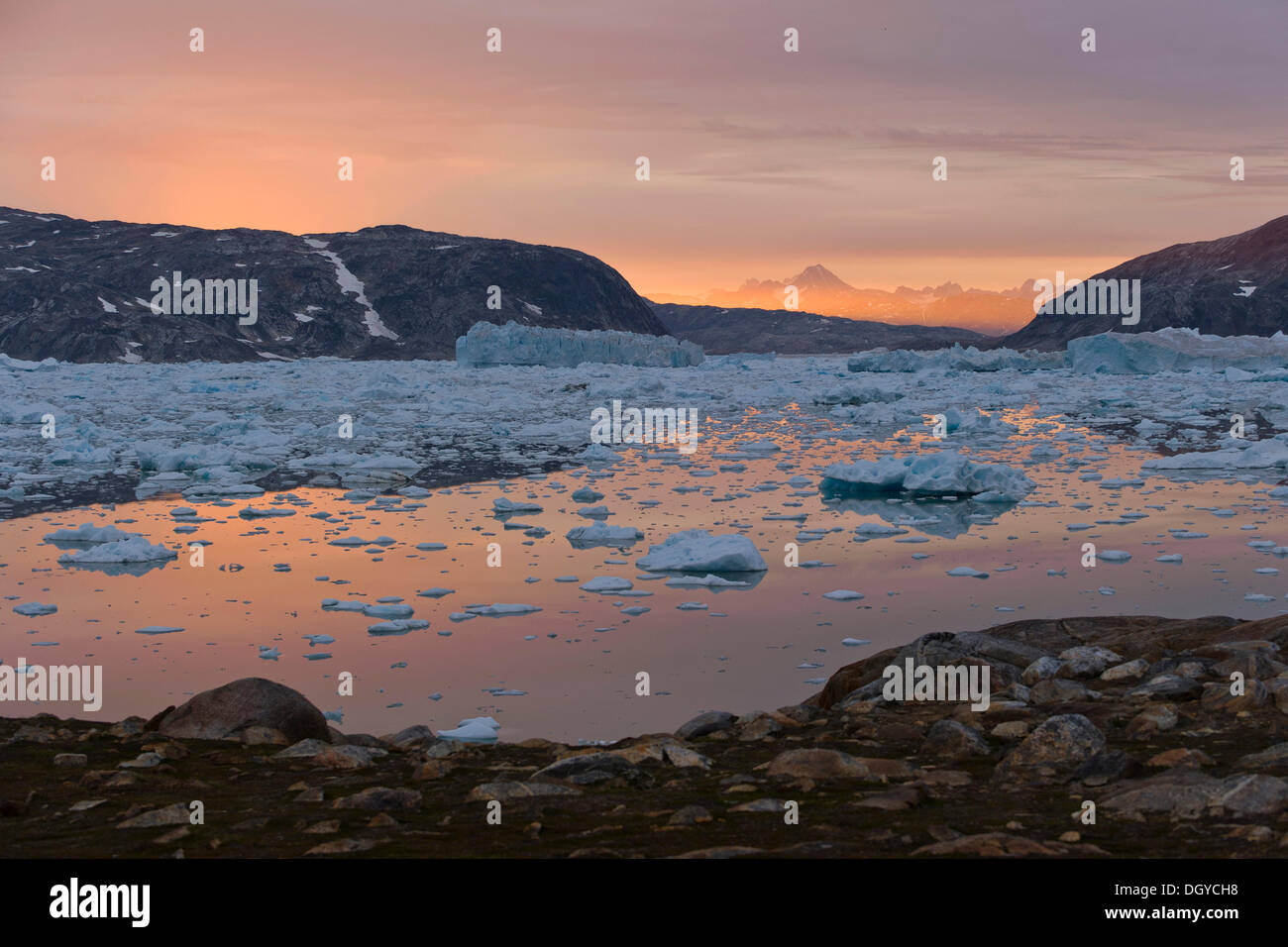 Midnight sun, ice and icebergs, Johan Petersen Fjord, East Greenland, Greenland Stock Photo