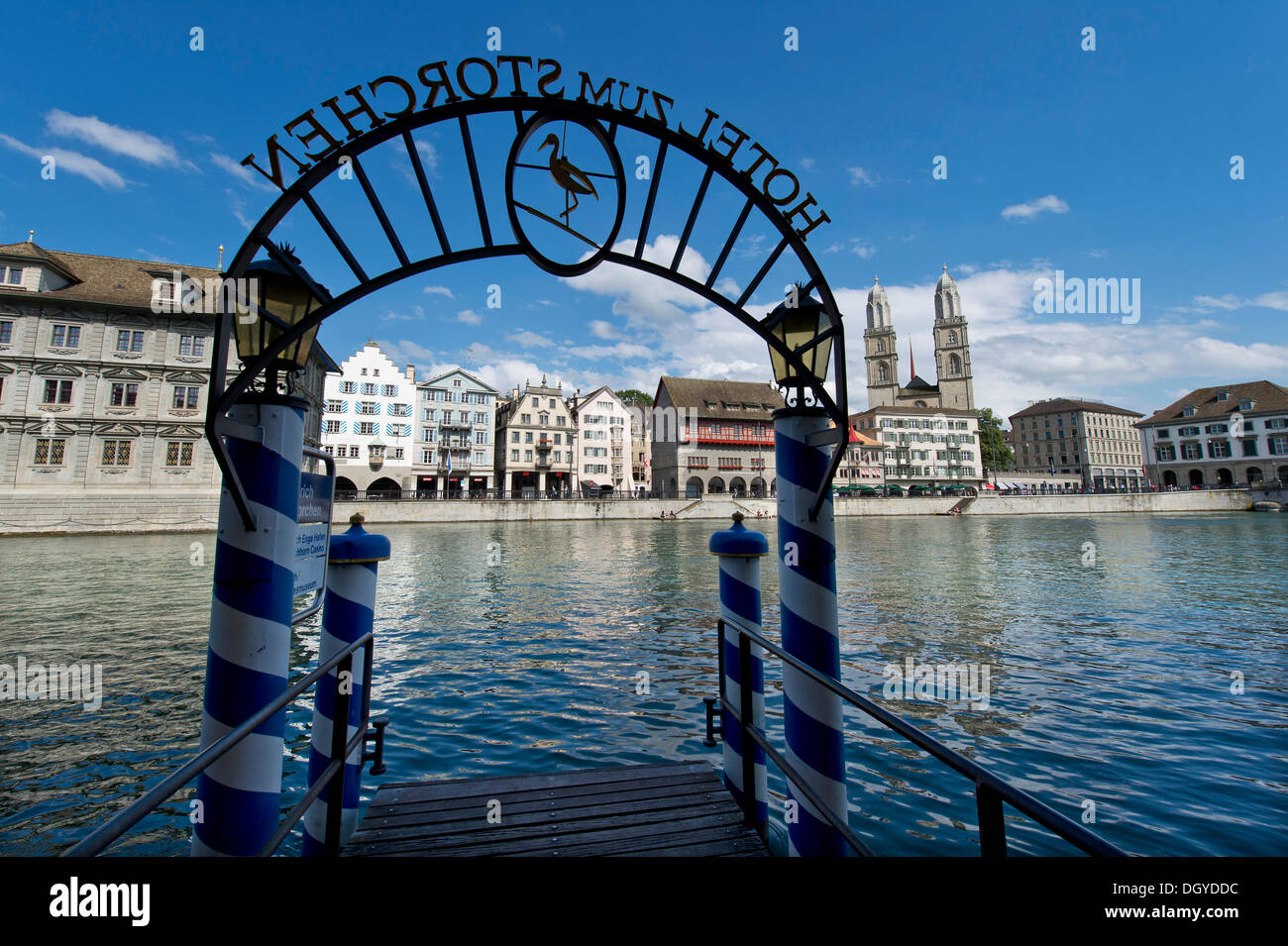 Jetty of the Storchen Hotel, Limmat river, Limmatquai with Town Hall, left, guild house 'Zum Rueden', twin towers of Stock Photo