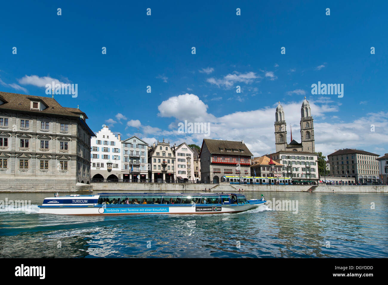 Limmat river, Limmatquai with the Town Hall, left, and the guild house 'Zum Rueden', twin towers of Grossmuenster church Stock Photo