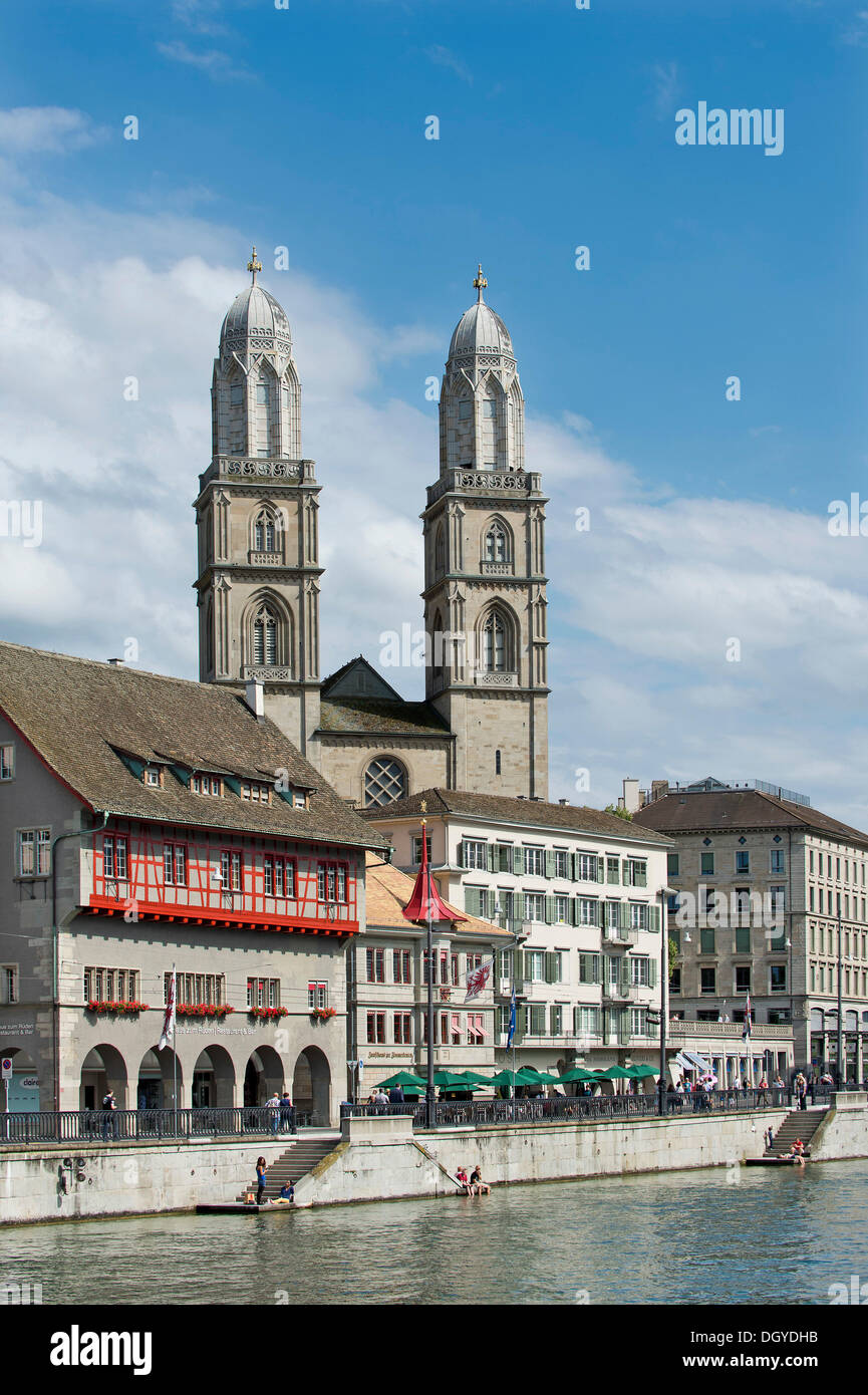 Limmat river, Limmatquai with guild house 'Zum Rueden' and the twin towers of Grossmuenster church, old town of Zurich Stock Photo