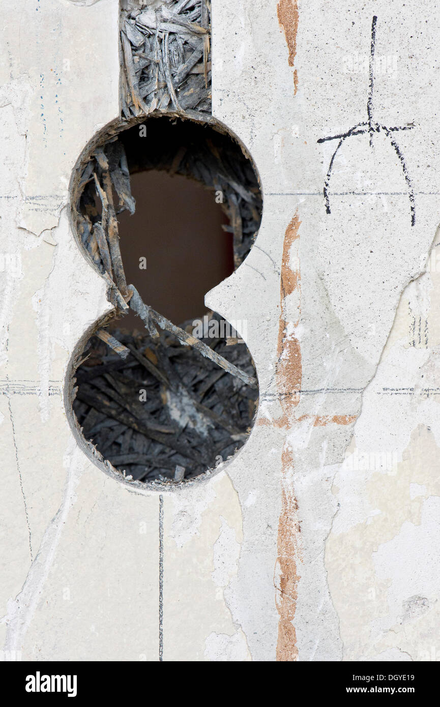 Preparatory work on a wall for installing new cable canals and sockets, electrical wiring in an old building, Stuttgart Stock Photo