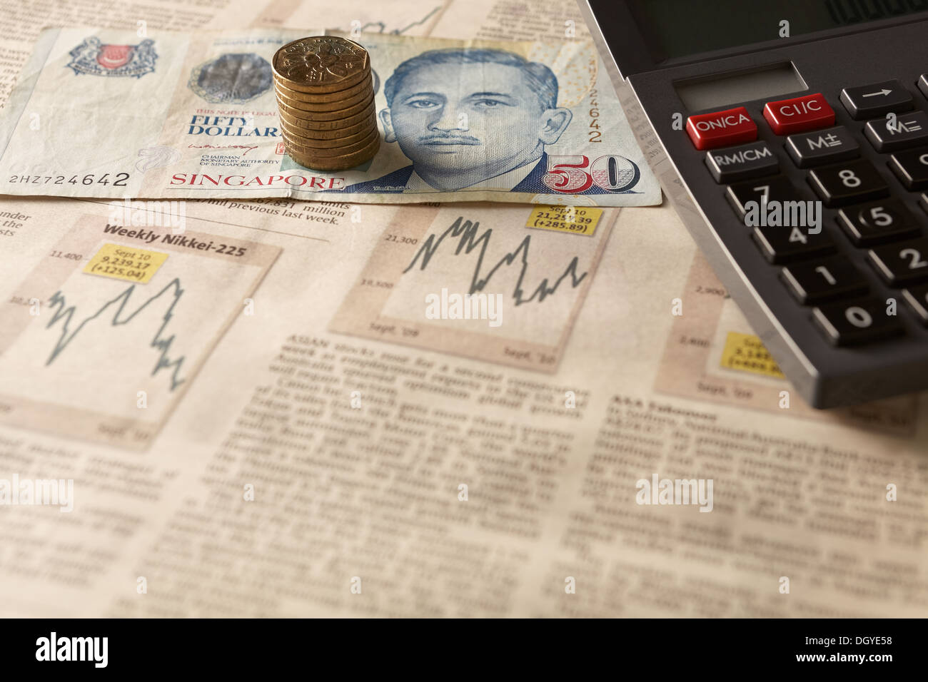 Business investment concept of stock and share market with calculator